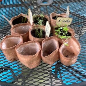 10 reusable seed starters. Burlap with waterproof liner. Labels not included.